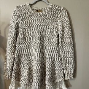 Beautiful beige sweater with lace bottom.